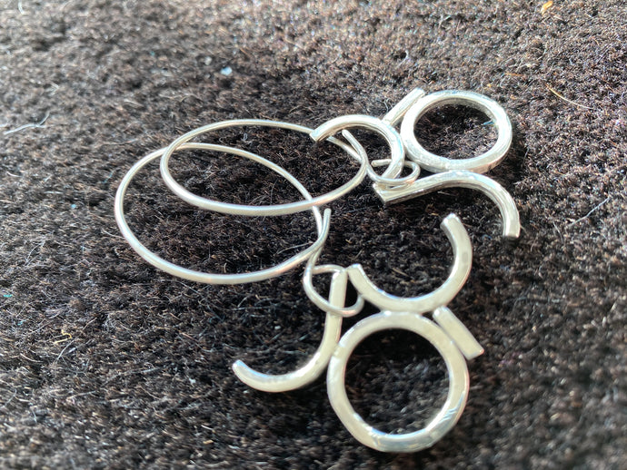 Handmade joy letter earrings in silver