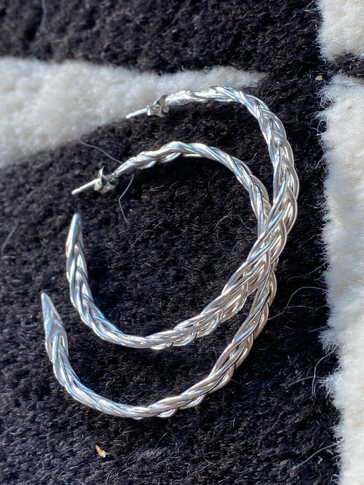 Handmade braided rings as earrings