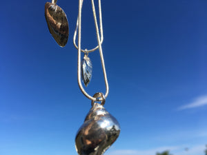 Solid Strandsnäcka i silver som hänge till halsband